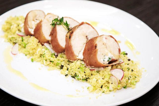 Ricotta stuffed chicken wrapped in parma ham with Moroccan couscous salad.